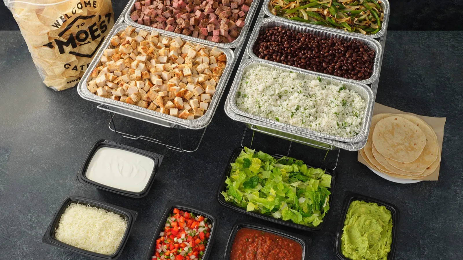 Moe's catering bar options including taco and fajita stations