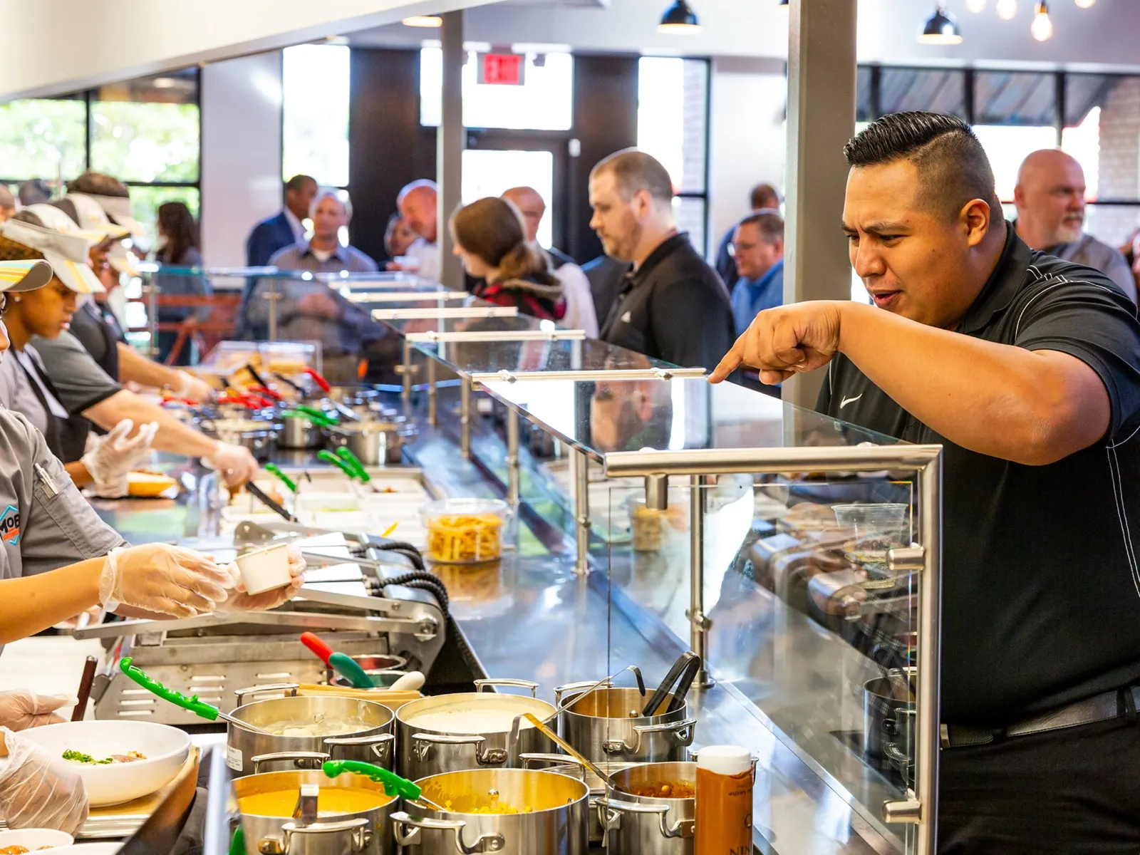 Moe's Southwest Grill interior showing the serving counter in Gainesville
